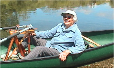 Picture of older person in row boat.